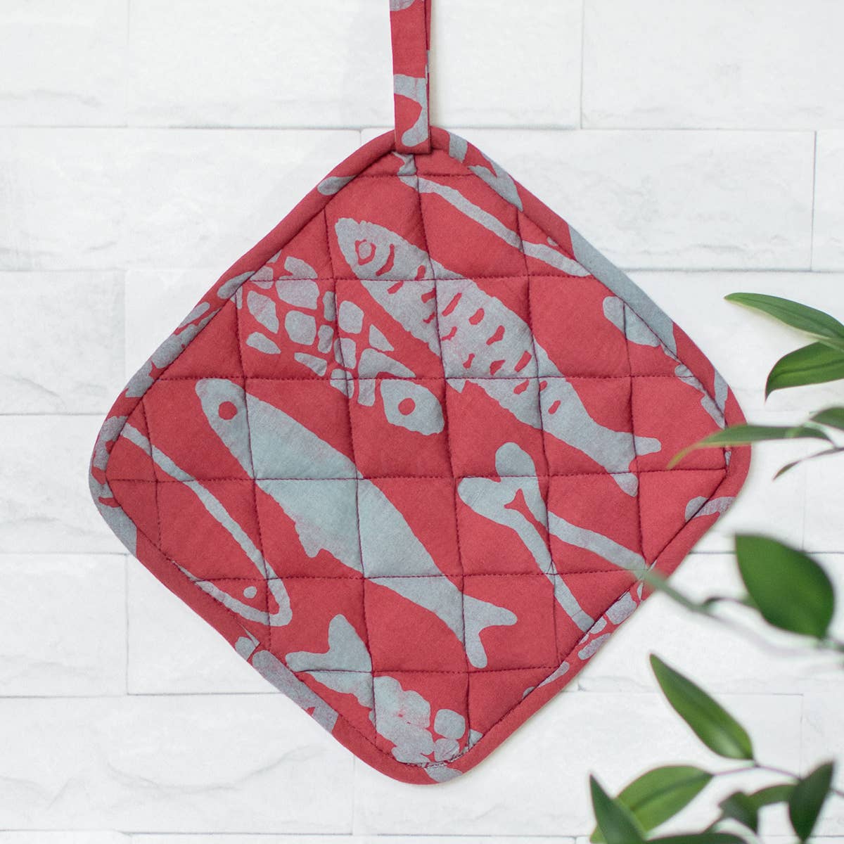 Organic Batik Pot Holder featuring colorful sardine design from Global Mamas, made with vibrant fabric and traditional craftsmanship.