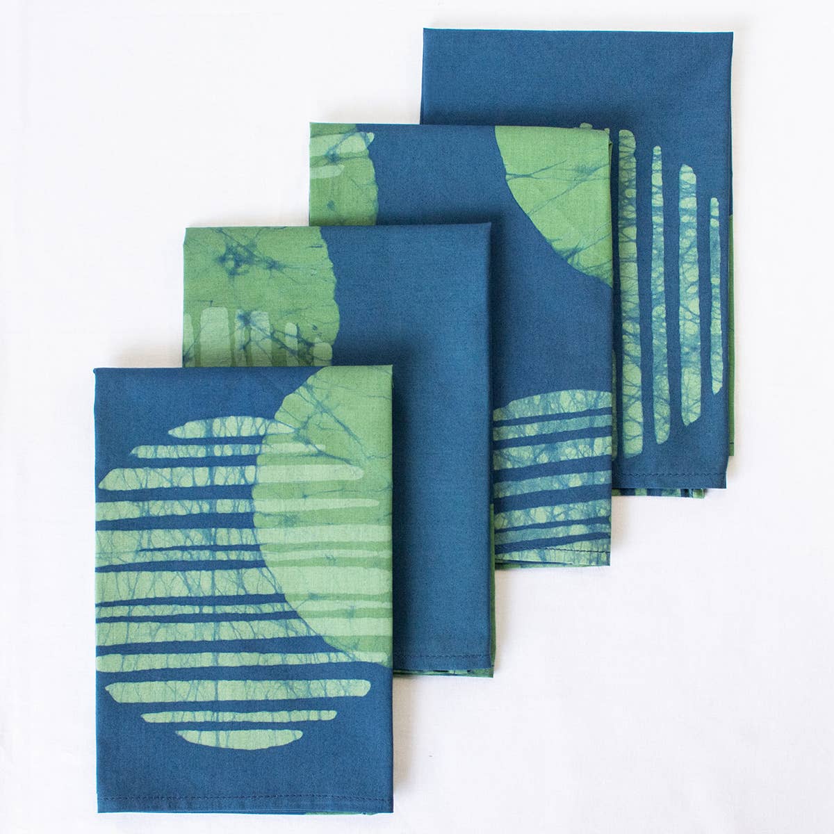 Organic Batik Napkin from Global Mamas featuring vibrant, handcrafted batik fabric with intricate patterns and eco-friendly design.