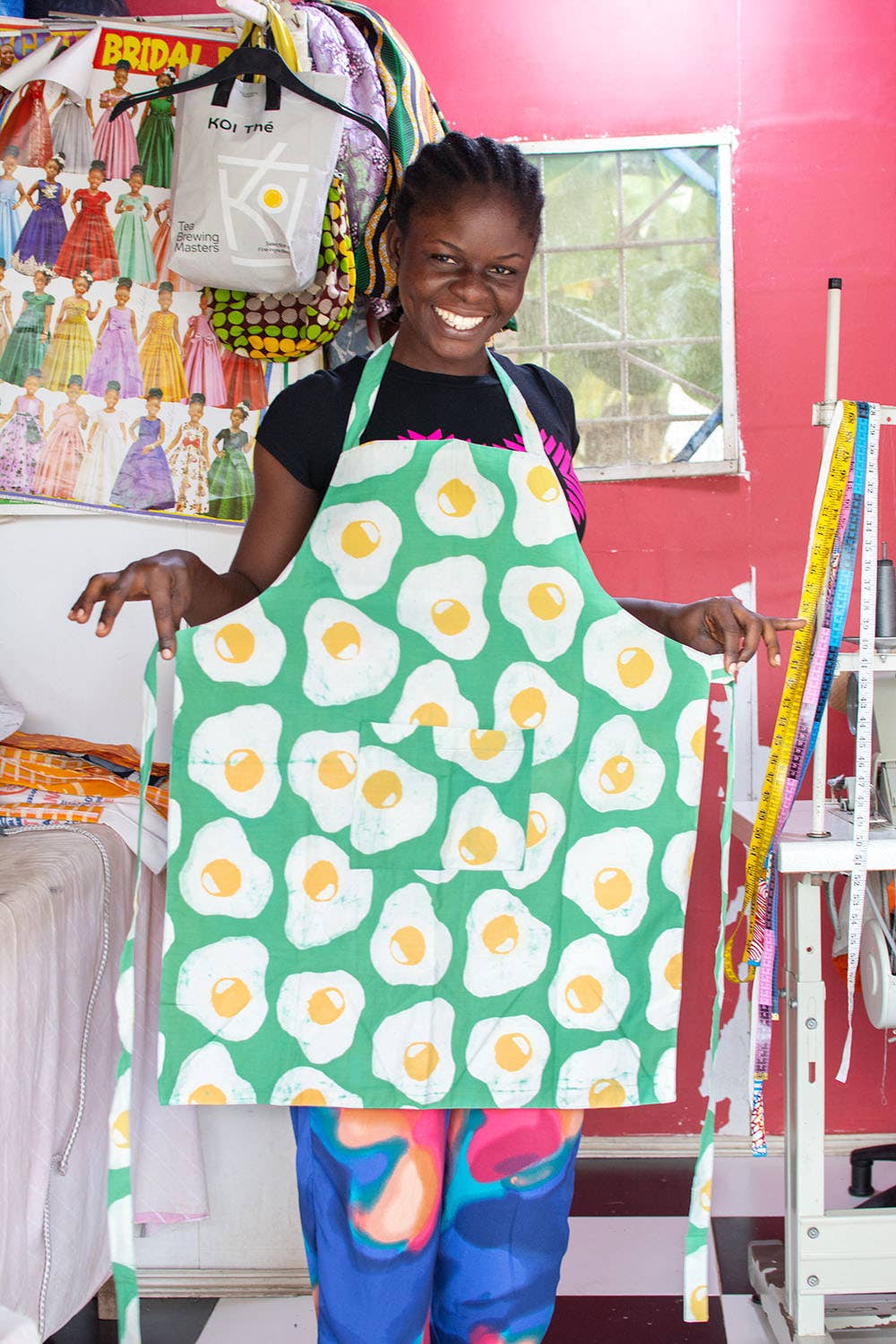 Reversible organic batik apron from Global Mamas featuring vibrant patterns and a comfortable fit for kitchen use.