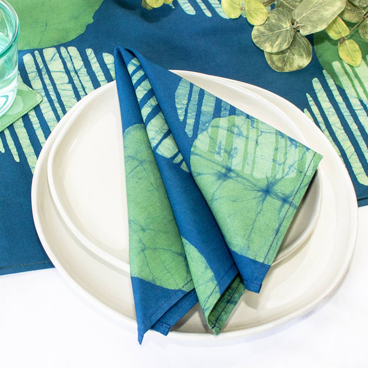Organic Batik Napkin from Global Mamas featuring vibrant, handcrafted batik fabric with intricate patterns and natural dyeing.