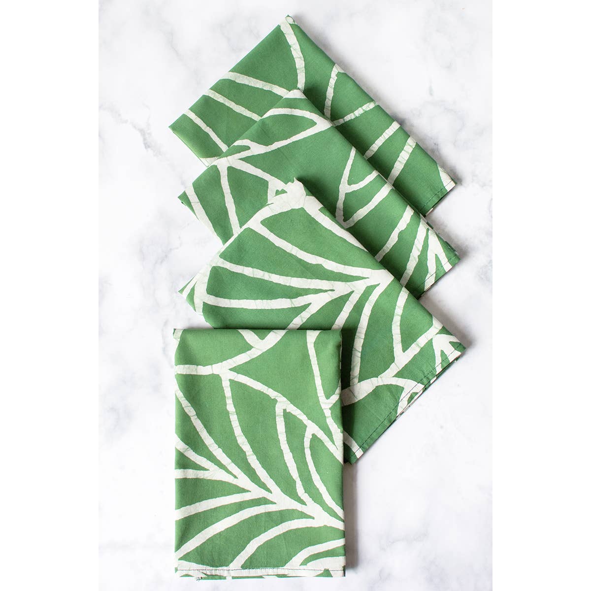 Organic Batik Napkin from Canopy by Global Mamas, showcasing vibrant hand-dyed batik fabric with intricate patterns