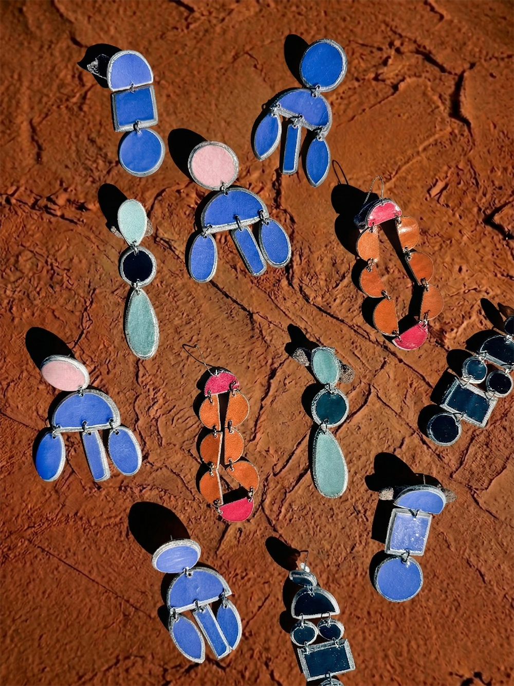 Collage of Sisanda Paper Pulp Earrings by Quazi Designs, featuring lightweight, eco-friendly earrings with intricate paper pulp craft details.