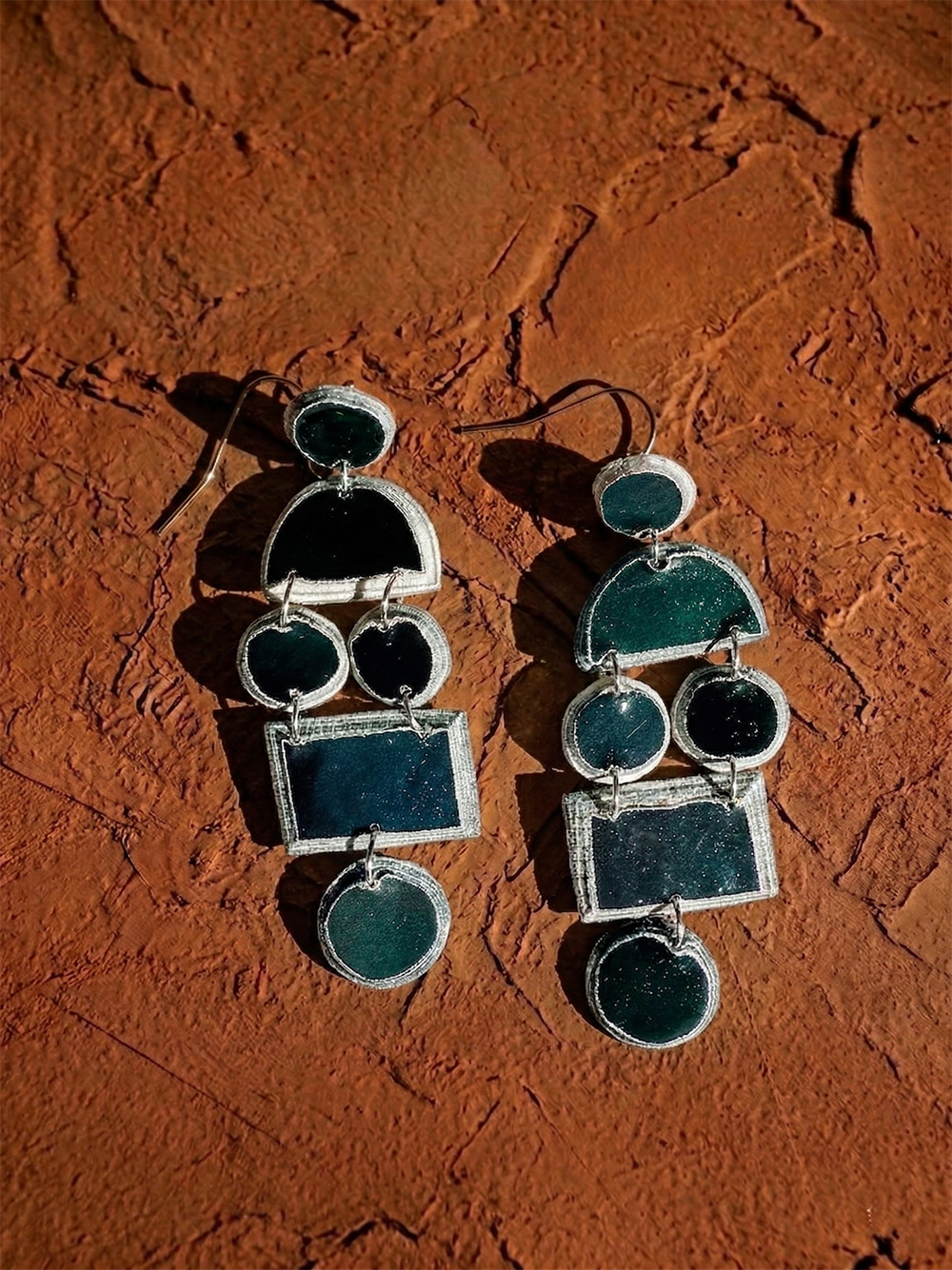 Nokuthula Paper Pulp Earrings by Quazi Designs featuring round, eco-friendly earrings with intricate natural fiber textures.