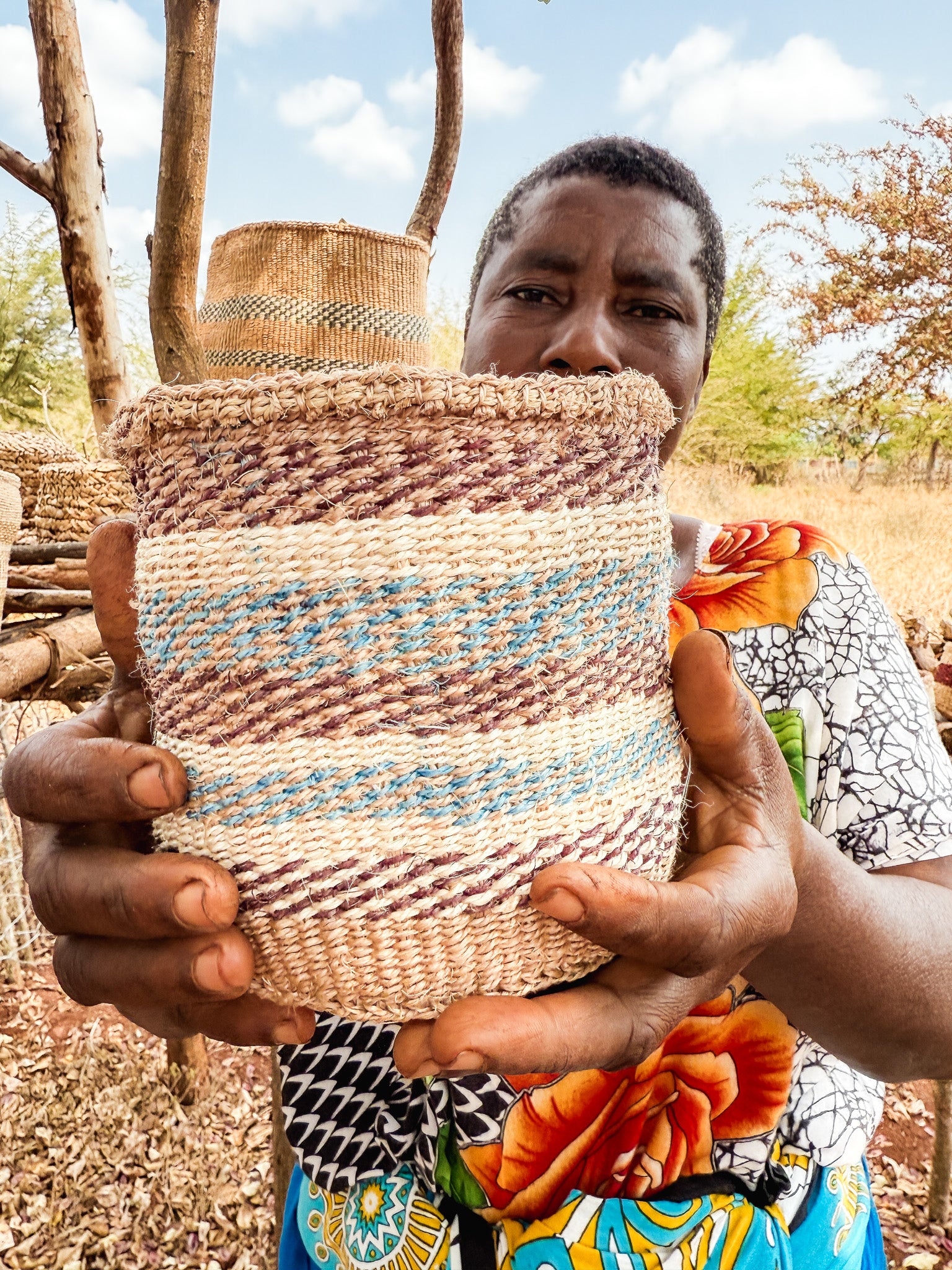 Hadithi thick weave sisal basket with sturdy handles, natural fiber texture, ideal for storage or decorative use.