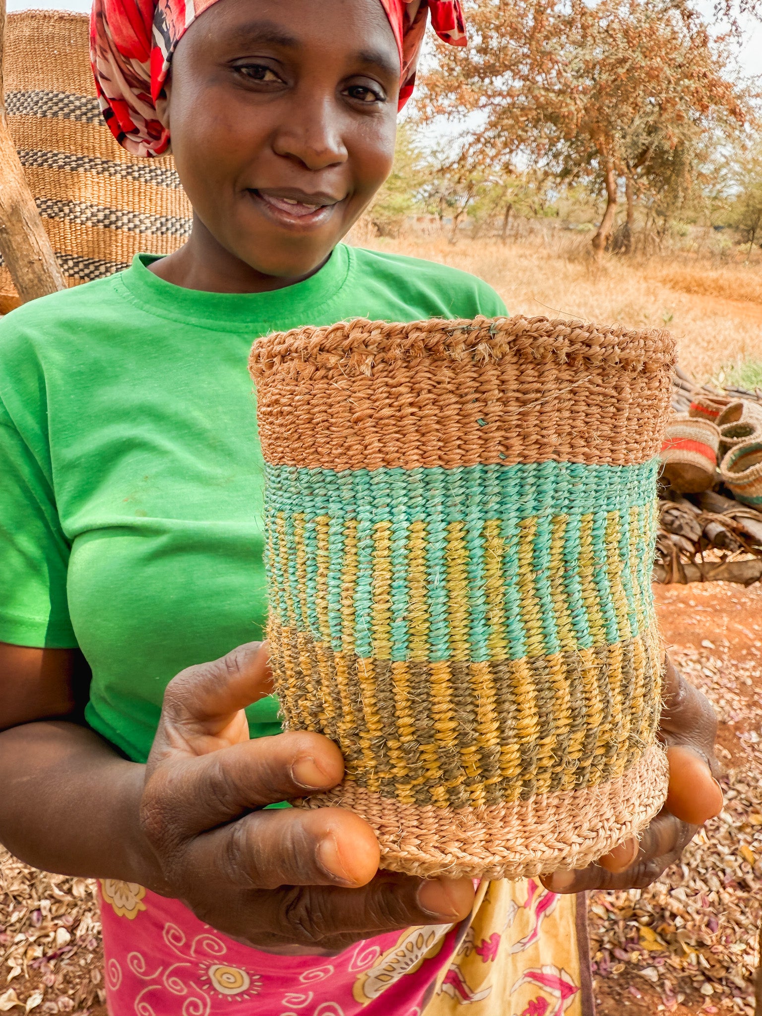 Hadithi thick weave sisal basket with sturdy handles, natural textured surface, and spacious interior for storage or decor.