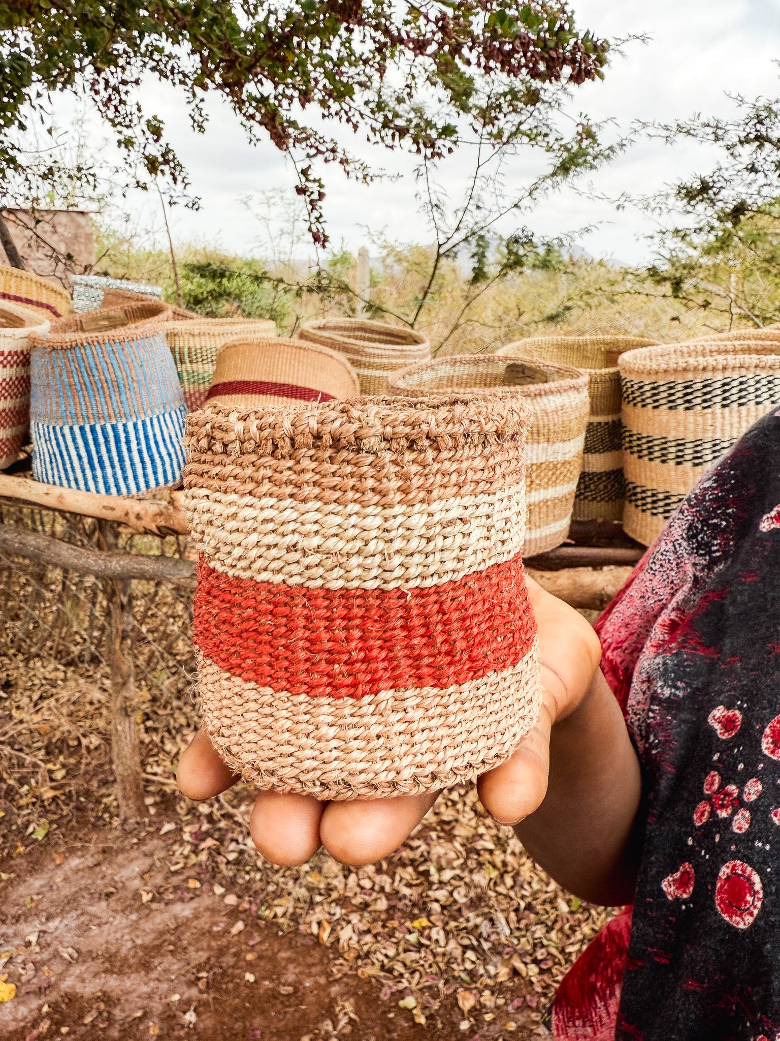 Hadithi thick weave sisal basket with sturdy handles, natural textured design for storage and home decor.