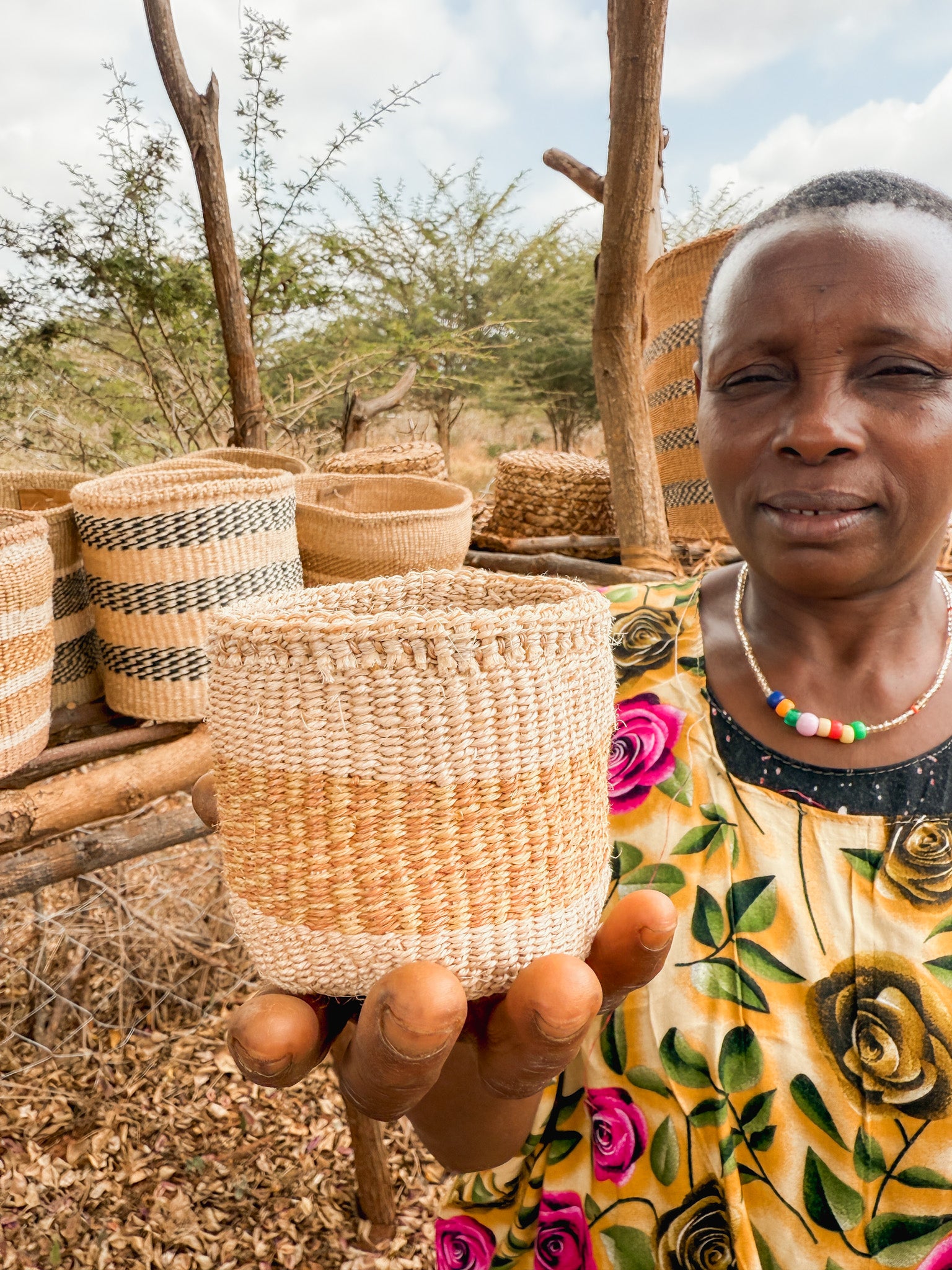 Hadithi thick weave sisal basket with sturdy handles, natural fibrous texture, ideal for storage or decorative use.