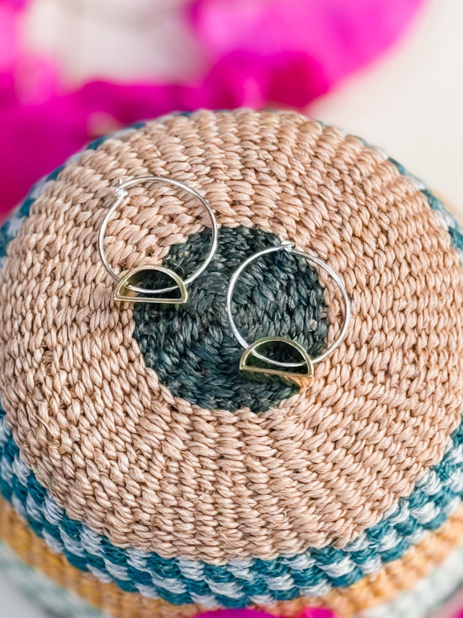Halfmoon brass earrings on silver hoops
