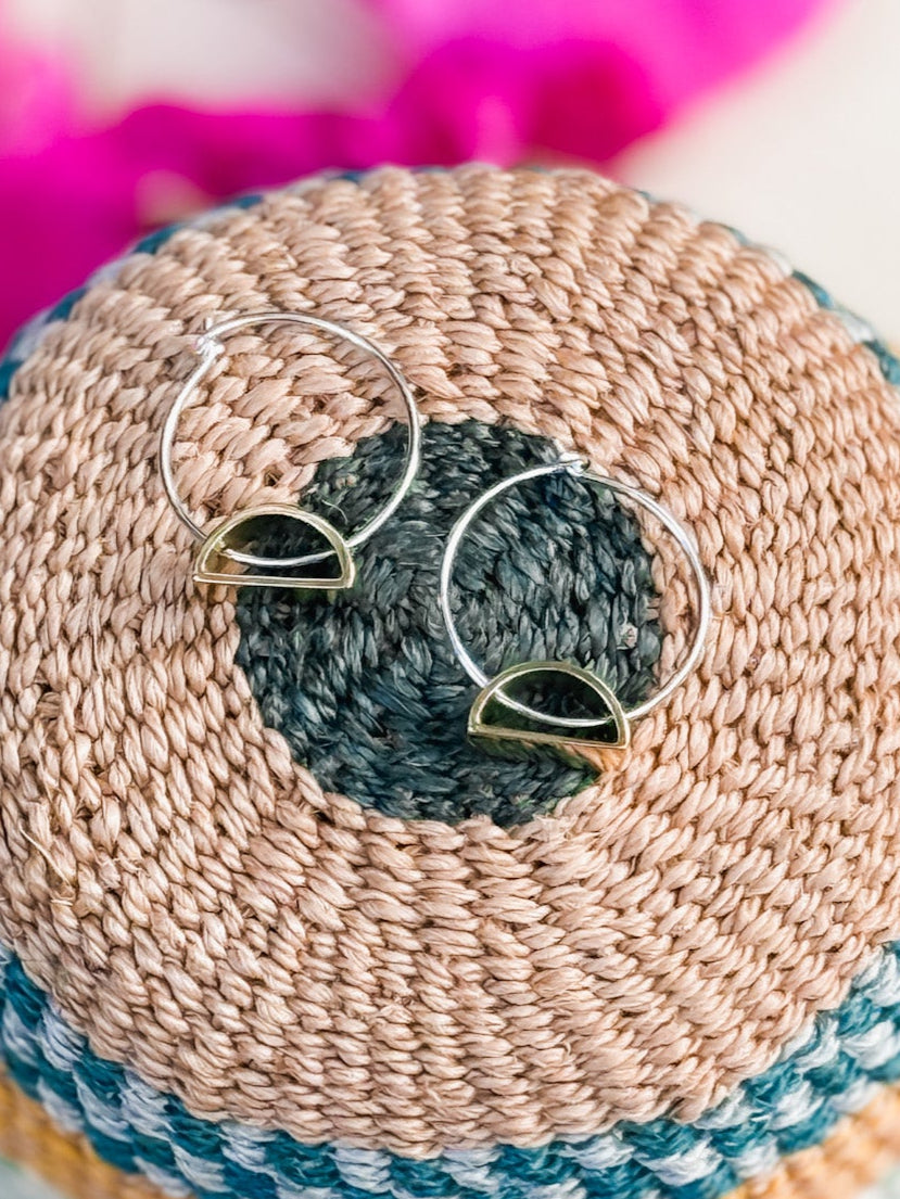Earrings with brass half moon charms on sterling silver hoops