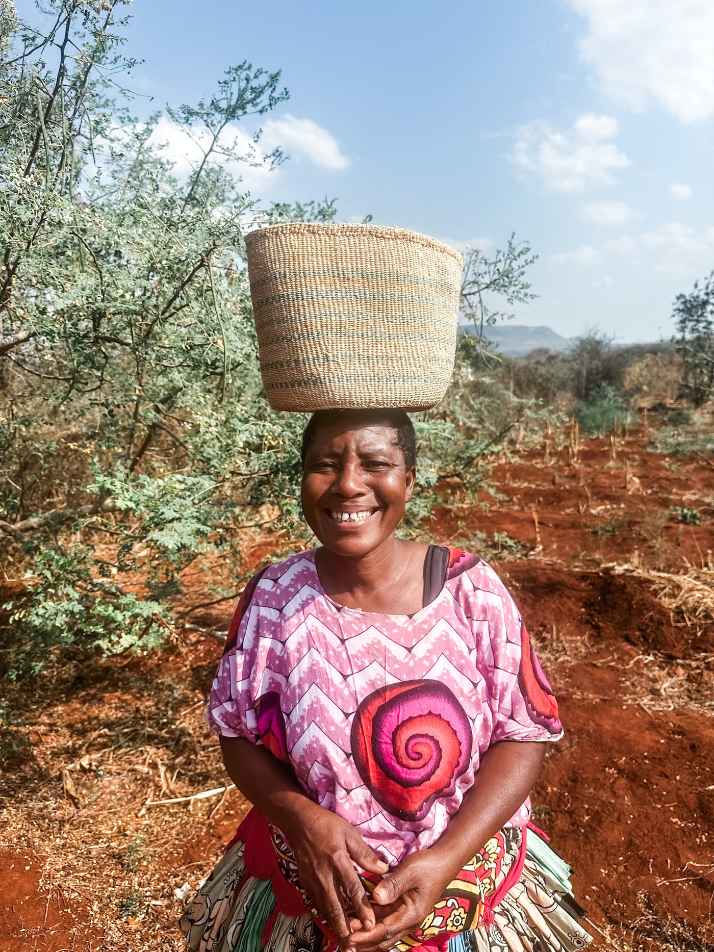 Scenic view from the Secret Gems of Kenya tour, showcasing lush landscapes and vibrant local culture with Zawadisha branding.