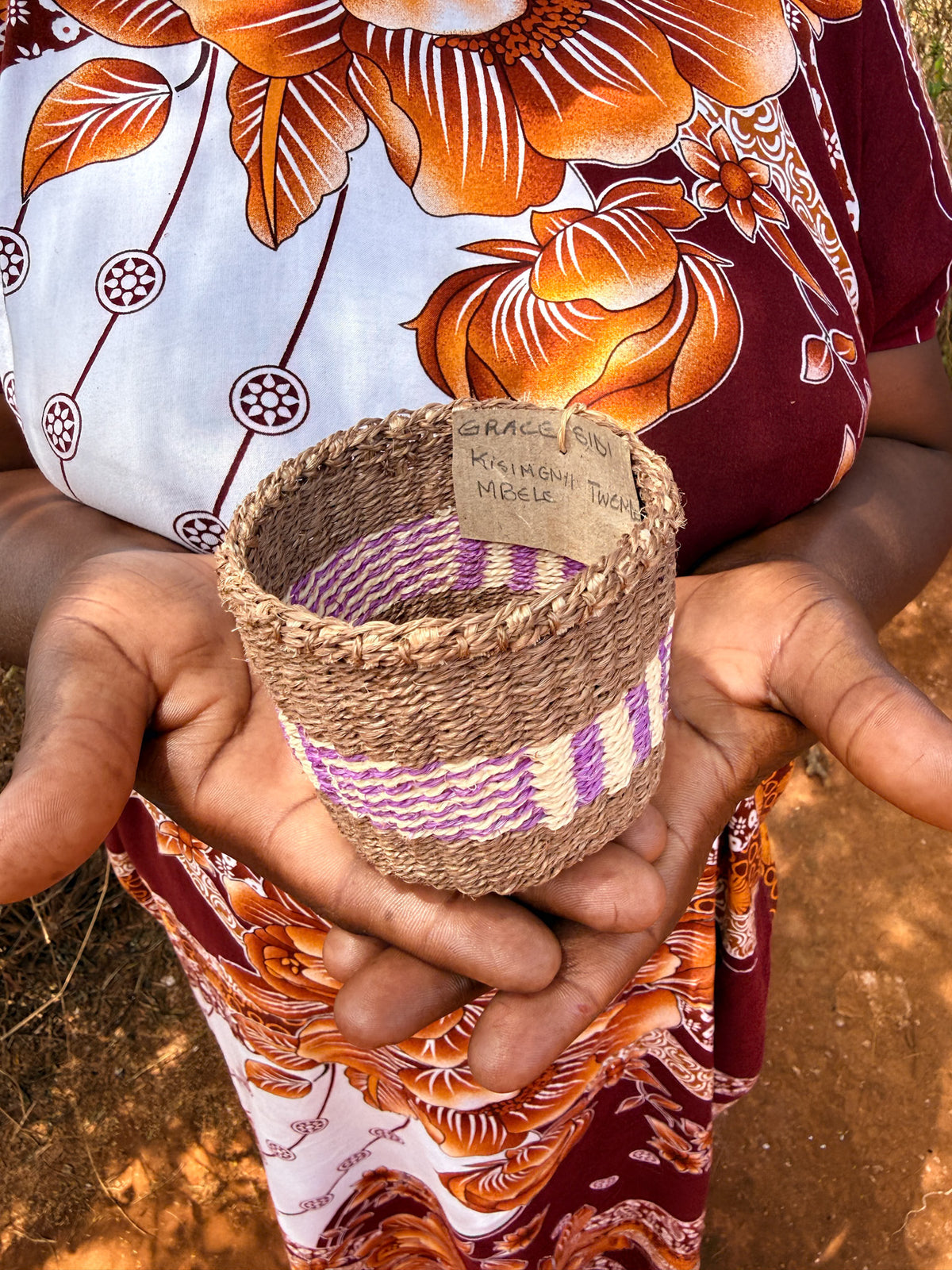 Mini sisal basket with a woven design from Zawadisha, perfect for storage or decoration.