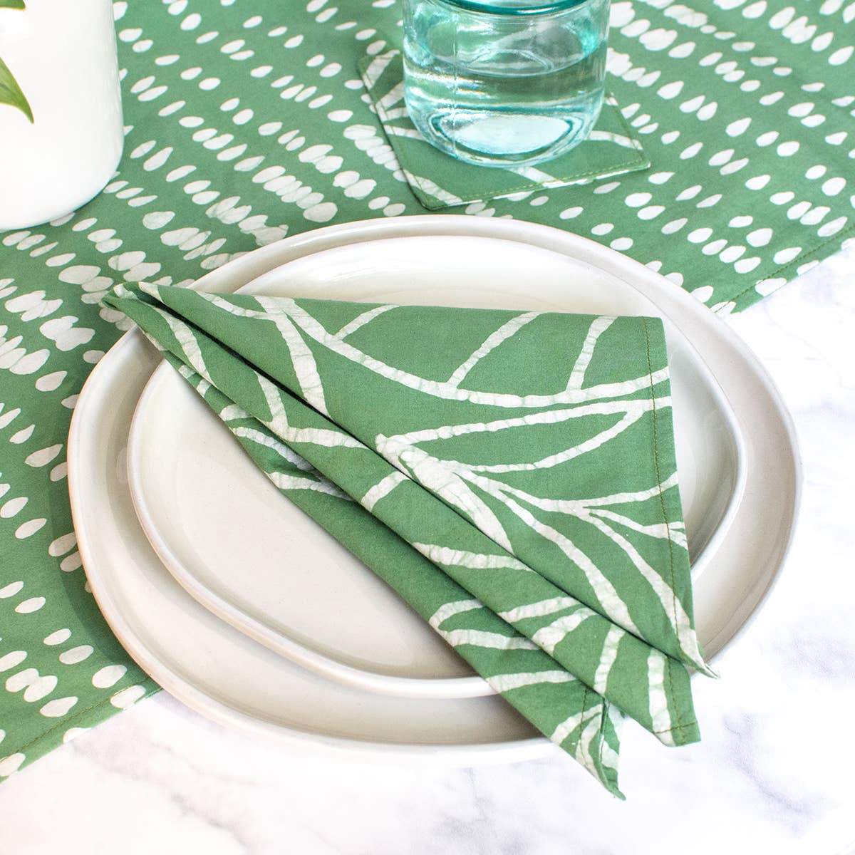 Organic Batik napkin from Global Mamas featuring vibrant traditional African batik patterns on soft fabric.