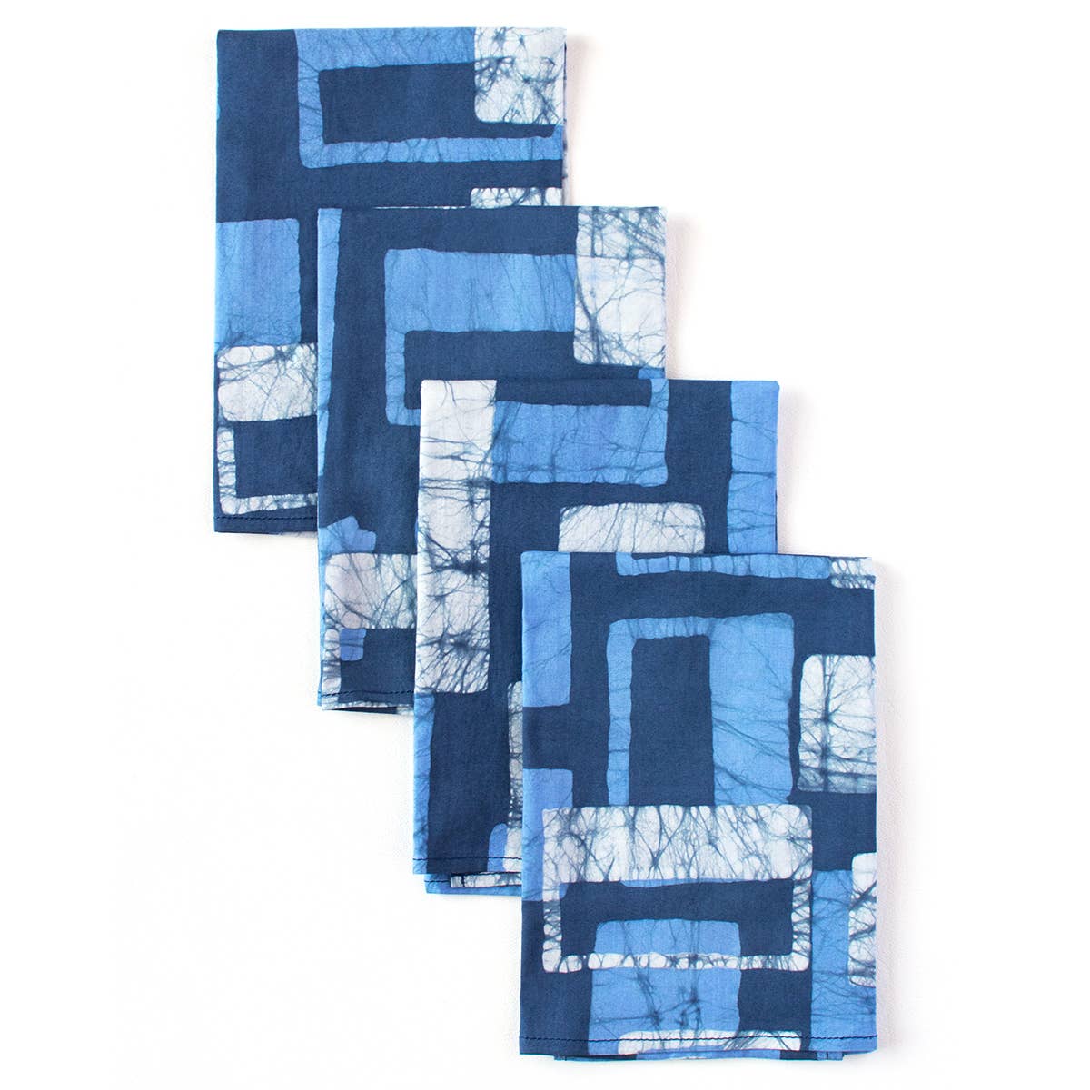 Organic Batik Napkins by Global Mamas featuring navy block patterns on woven fabric, showcasing traditional batik design.